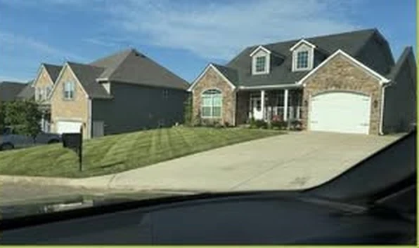 Front lawn with striped mowing pattern